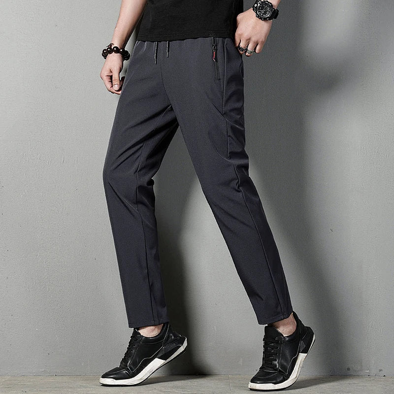 Summer men's casual pants slim fit thin Korean version ice silk pants Jinlun sports pants straight tube quick drying pants